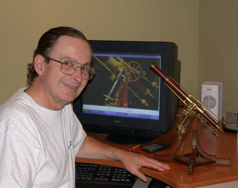 Bill Gould With Both Real and Cad Models Bill Gould with his scale model telescope, and the CAD model to match.