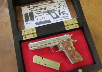 A finished miniature Colt in its case.