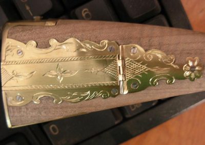 Engraved patchbox cover.