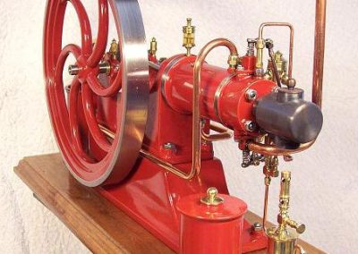 A finely painted hot-bulb engine.