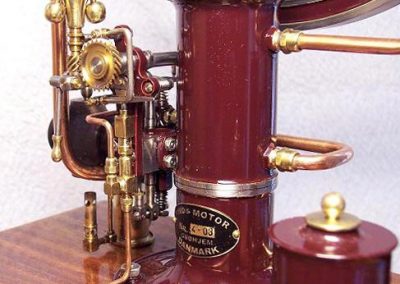 A close-up of the inverted hot-bulb engine.