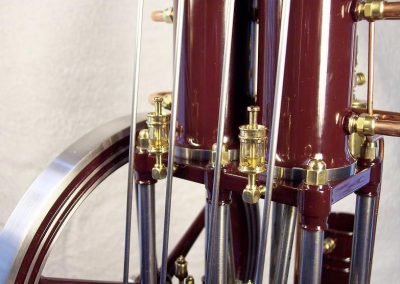 A close-up reveals the cylinder oilers.