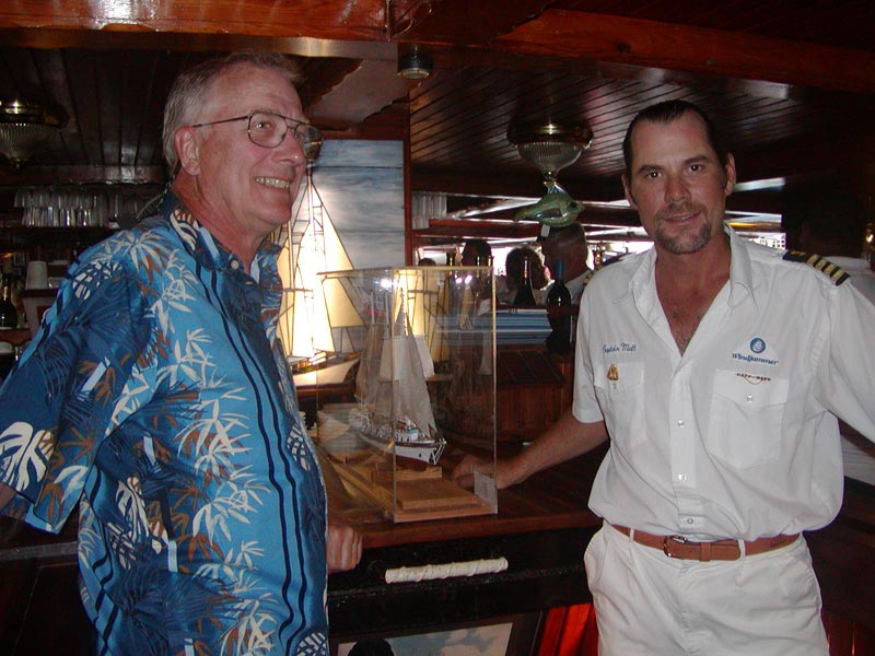 James With His Model Cruise Ship James presents his model of the cruise ship, Mandalay, to the ship's captain.