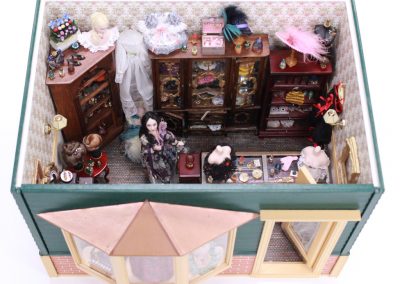 A tiny dress shop boutique diorama.