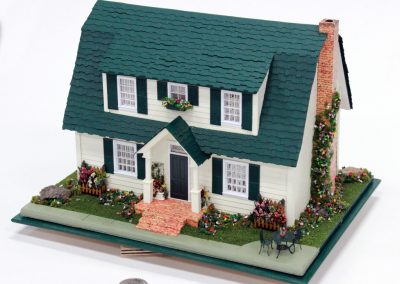 A French Colonial style dollhouse.
