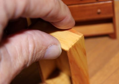 A close look at Cushman's miniature furniture.