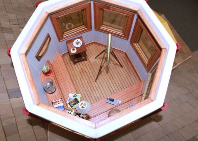 The tiny cupola at the top of the dollhouse.