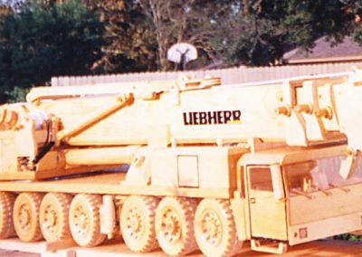 The wooden scale model eight-axle crane truck.