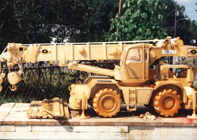 A wooden two-axle portable crane.