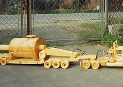 In this photo, a different semi model hauls a trailer built for heavier loads.