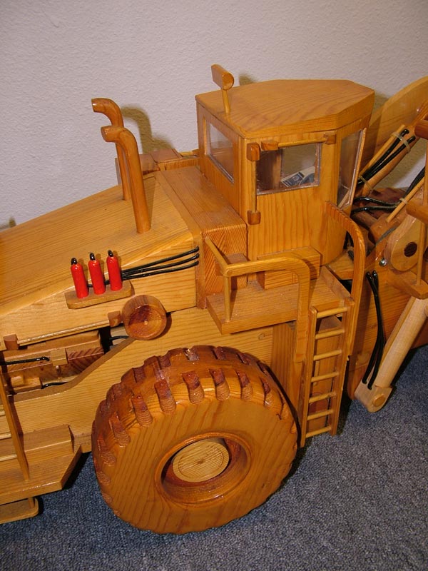 This wooden Marathon-LeTourneau L-1100 front end loader was built at a scale of 1/15.2.