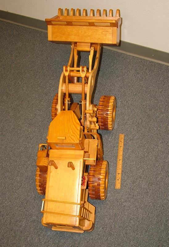 This wooden Marathon-LeTourneau L-1100 front end loader was built at a scale of 1/15.2.