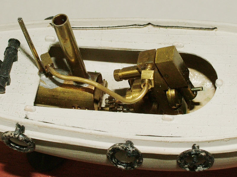 A close-up look at the tugboat engine and boiler.
