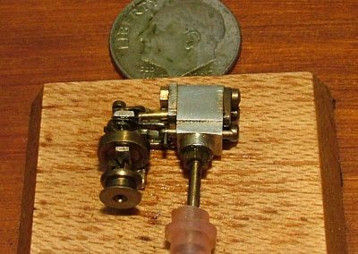 A tiny double-acting steam engine.