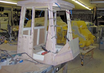 Building the cab for the Cat wheel loader.