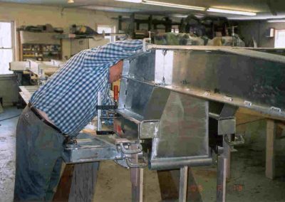 Fred checking welds on his scale trailer build.