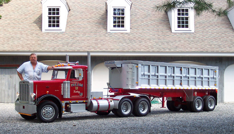 Fred With His Peterbilt Fred standing with his finished 1/2 scale Peterbilt.