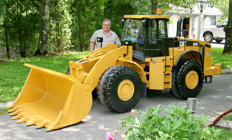 1/2 Scale Cat 980H Wheel Loader Fred stands behind his 1/2 scale Cat wheel loader.