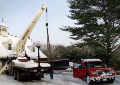 Putting the Rachel H. onto it's trailer.
