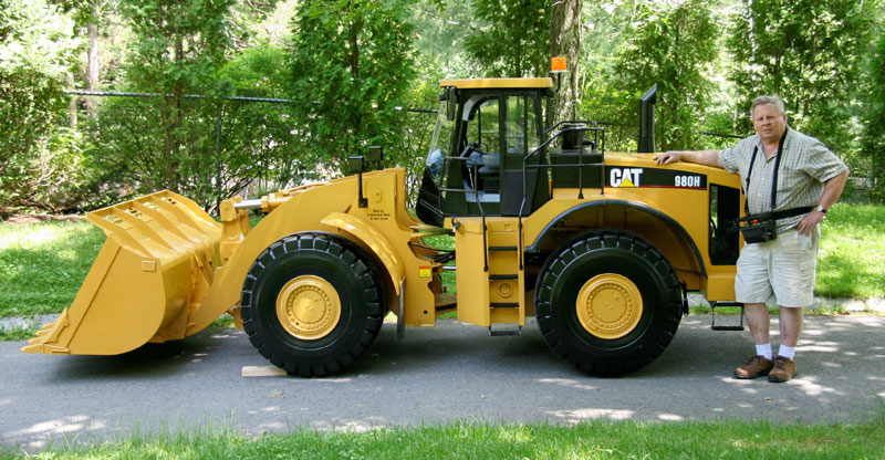 Fred With His Cat Wheel Loader Fred with his scale model Cat wheel loader.
