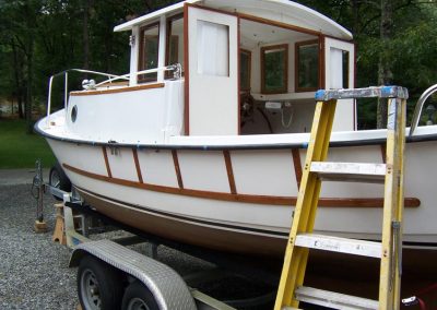 Noel Carmichael's full-size boat, which the memorial model replicates.