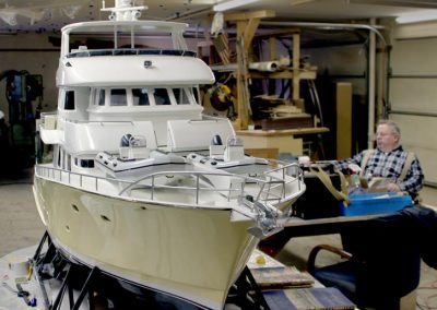 Fred sits near his virtually finished Crosswinds II model.