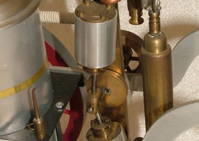 A close-up detail on the horse-drawn fire pump.