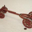 A scale model wagon made for hauling logs. 
