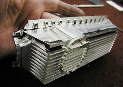 The machined pan for the Duesenberg engine.