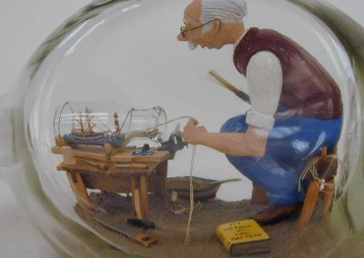 A close view of Phil's ship in a bottle, in another bottle.