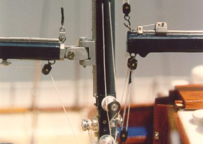 Winches and fittings abound on the masts and deck.