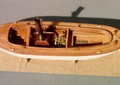 The steam-powered launch.