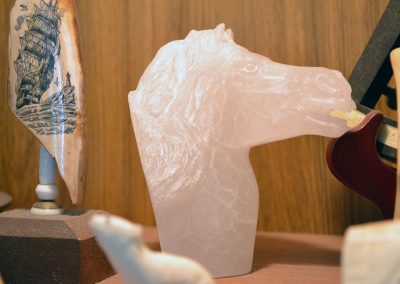 A horse head carved from stone.