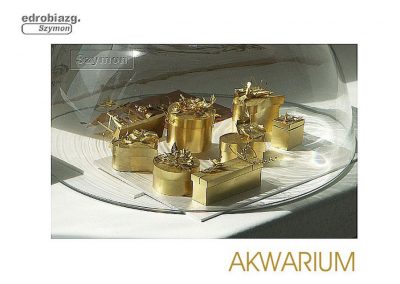 Miniature brass gift boxes.