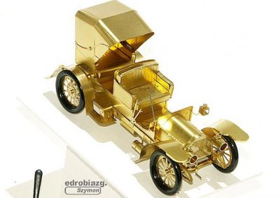 Szymon's tiny brass Mercedes Simplex.