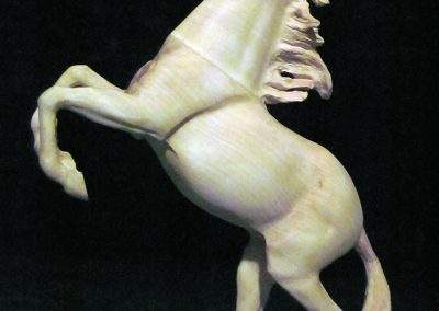 A wooden horse carved by Chris.