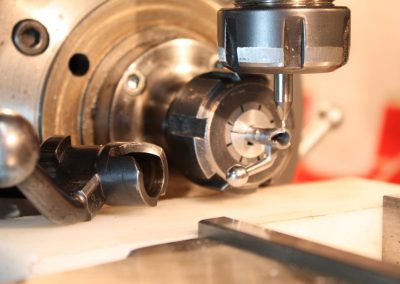 The helicoidal milling operation at the end section of the bolt.