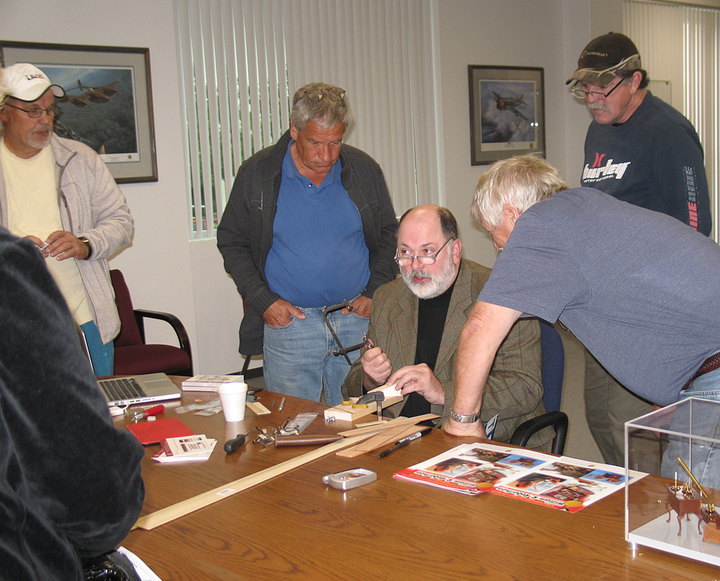Bill Demonstrating His Dovetail Technique Bill demonstrating his dovetail cutting technique to museum visitors.