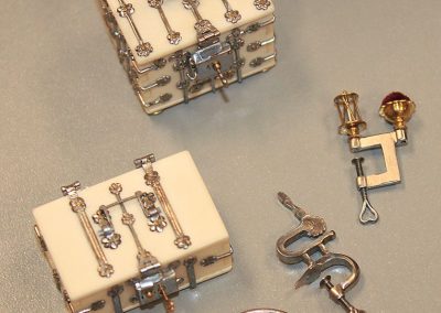 This photo shows two bone and steel chests.
