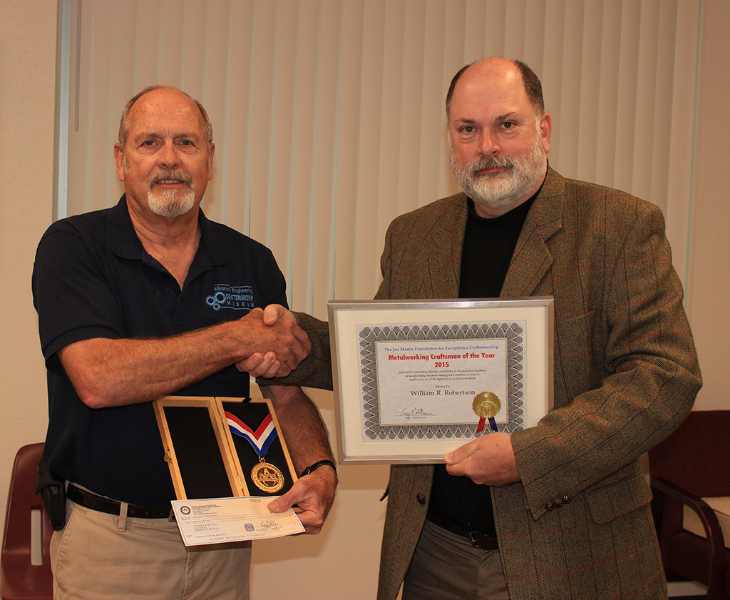 Craig Libuse and Bill Robertson Bill (right) receiving his Craftsman of the Year Award in 2015.