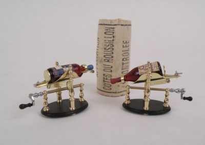 Miniature wine pourers.