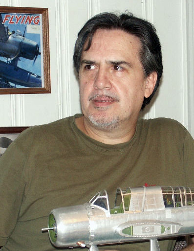 Guillermo Rojas-Bazan Guillermo Rojas-Bazan with one of his fine scale models.