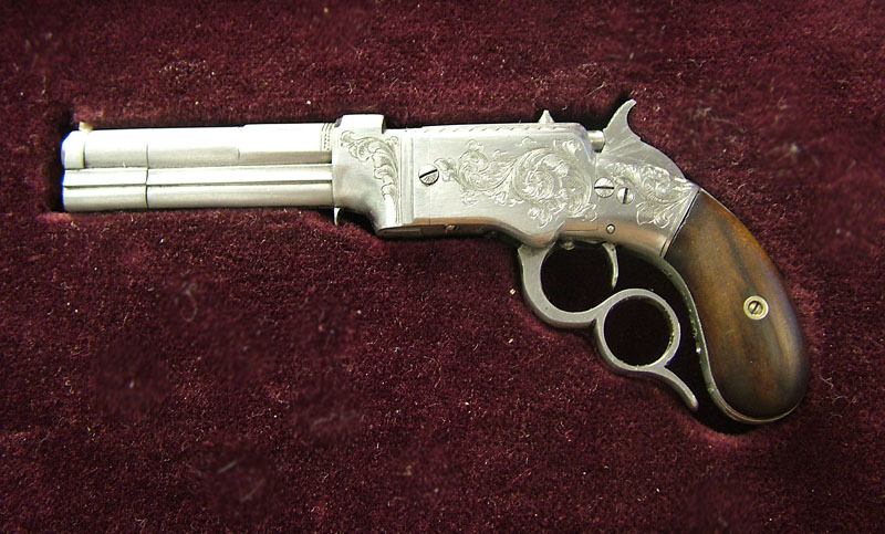1854 Smith & Wesson “Volcanic” Pistol A miniature 1854 Smith & Wesson Volcanic pistol.