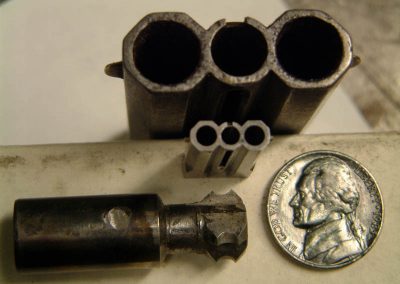 The full-size and miniature Derringer barrels.
