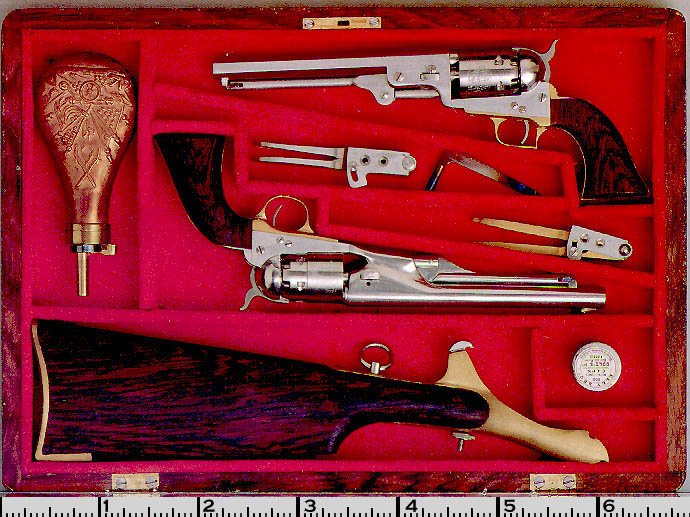 Colt Percussion Revolvers A cased set including two Colt Percussion Revolvers and a shoulder stock.