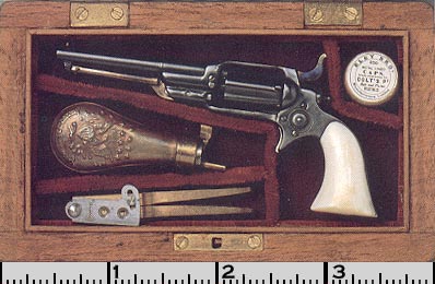 Colt Root Model Revolver David’s miniature Colt Root Model 1855 revolver.