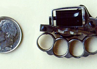 This photo shows the fighting gun in the folded position.