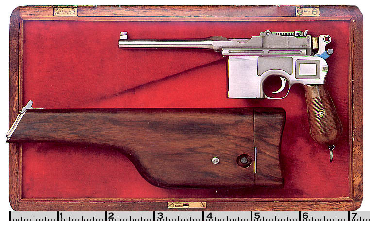 Mauser With Stock A miniature Mauser with detachable wooden shoulder stock in its display box.