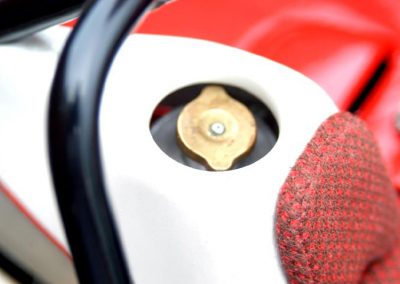 The fuel cap is behind the driver.