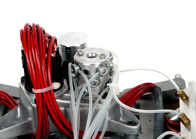 The distributor and ignition wires.